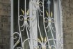 Элегантные и надежные кованые решетки на окна выполняют одну очень ва фото № 3