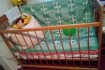 Продам детскую кроватку деревянная, с матрасом, на колесиках, высота  фото № 1